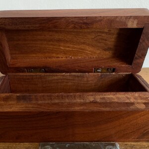 May include: A set of three ceramic mugs with a speckled, matte finish. The mugs are in shades of cream, light gray, and dark gray. Each mug has a simple, minimalist design, perfect for coffee or tea.