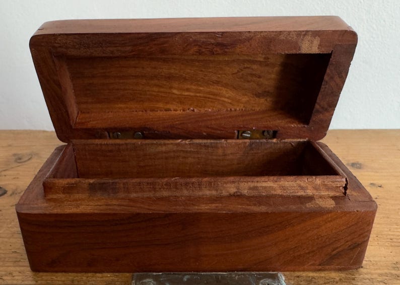 May include: A set of three ceramic mugs with a speckled, matte finish. The mugs are in shades of cream, light gray, and dark gray. Each mug has a simple, minimalist design, perfect for coffee or tea.