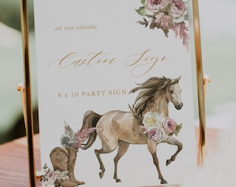 May include: A framed party sign with a gold border. The sign features a watercolor illustration of a horse adorned with flowers and a cowboy boot. Text on the sign reads "Custom Signs" and "8 x 10 Party Sign."