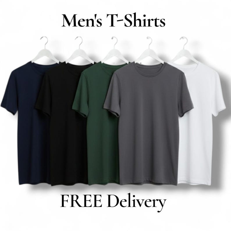 May include: A collection of five solid-color T-shirts in navy, black, forest green, gray, and white, hanging on white hangers. The text "Men's T-Shirts" is at the top, and "FREE Delivery" is at the bottom.