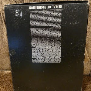 May include: A black box with the text "REPEAL OF PROHIBITION" in white. The box has text describing the history of the Chicago Tribune and the end of Prohibition. The box has a price tag of $3.