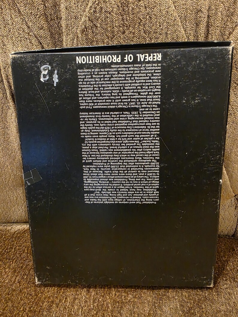 May include: A black box with the text "REPEAL OF PROHIBITION" in white. The box has text describing the history of the Chicago Tribune and the end of Prohibition. The box has a price tag of $3.