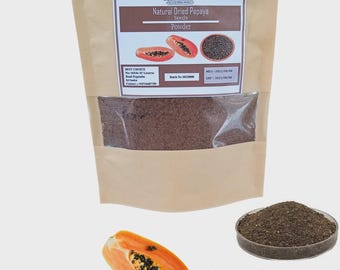 May include: A brown paper bag of natural dried papaya seeds powder with a clear window. The bag has a label with the text "BEST CHOICE" and "Natural Dried Papaya Seeds Powder". Two papaya halves and a bowl of seeds are also shown.