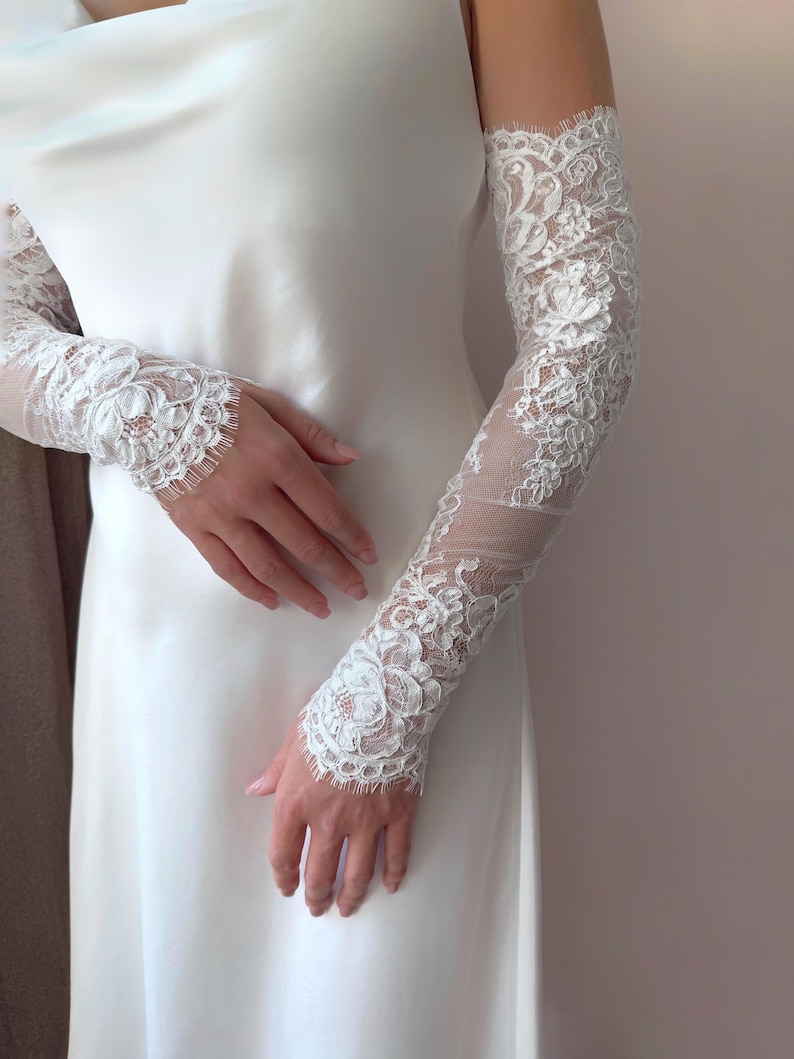Long lace fingerless wedding sleeves for bride, delicate floral embroidery on mesh