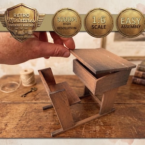May include: A miniature wooden school desk with an open drawer. The desk is brown and has a vintage aesthetic. The image includes text that says "Retro Miniatures" and "Easy Assembly".