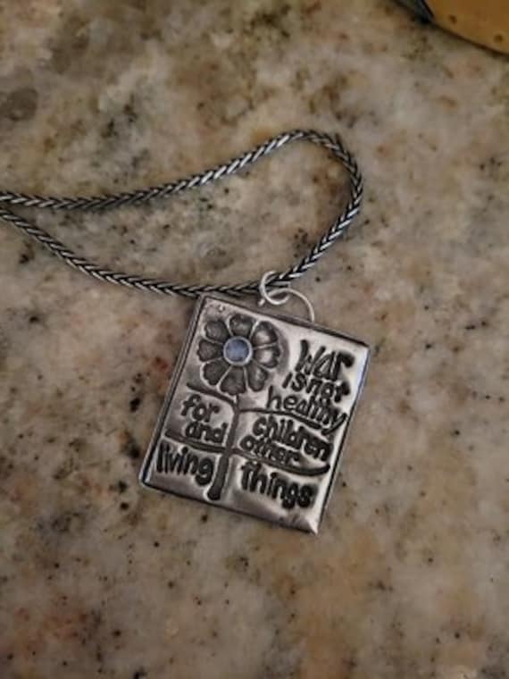 War is Not Healthy Sterling Silver Pendant Necklace: John Denver