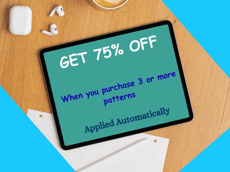 May include: A tablet displays the text "GET 75% OFF" in white, with additional text in blue. The tablet is on a wooden surface, accompanied by white earbuds and a charging case. A cup of coffee is also visible.