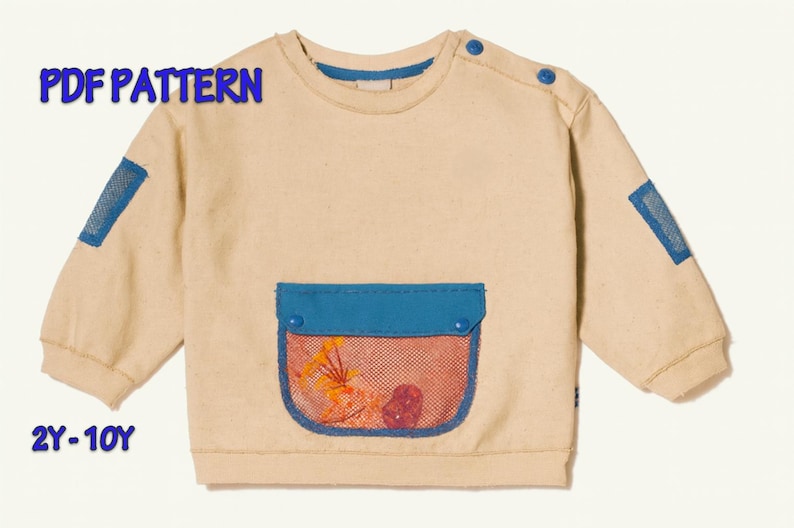 May include: Beige long-sleeved sweatshirt with blue accents and a pocket. The pocket has a red mesh overlay with a floral design. The text "PDF PATTERN" and "2Y-10Y" are visible on the image.