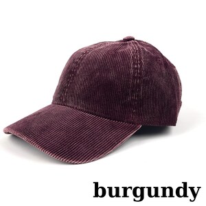 May include: Burgundy corduroy baseball cap with a curved brim. The cap is made of a ribbed fabric and has a rounded crown. The word "burgundy" is printed in a bold, sans-serif font at the bottom of the image.