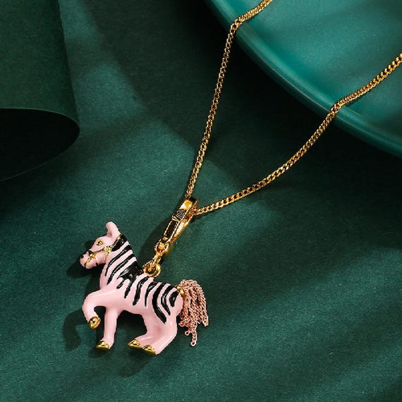Juicy couture pink zebra charm