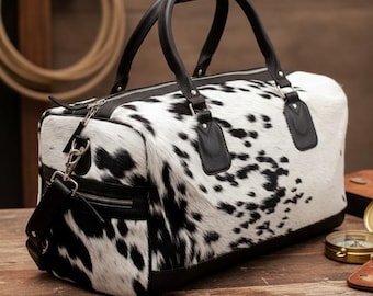 Handgearbeiteter Weekender aus Rindsleder: Schwarz-Weißer Hair-on-Leder Weekender
