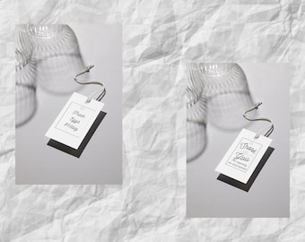 May include: Two white tags with text, one reading "Fresh Eggs $4/doz" and the other "Thank You with small business". The tags are attached with string. The background is a textured, white surface.