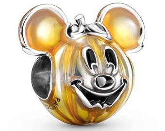 Pandora Disney Mickey Mouse Pumpkin Charm made of sterling silver with hand-applied transparent orange enamel.