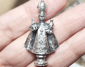 Mini estatua del Niño Jesús de Praga (derecha)