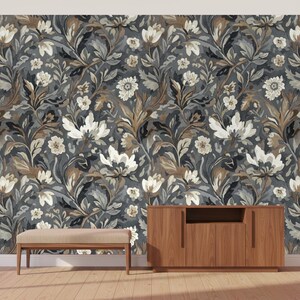 May include: A wallpaper featuring a dense floral pattern with white and cream blossoms, brown and gray foliage, and swirling stems set against a dark charcoal background. The design repeats across the surface in a continuous, intricate botanical arrangement.