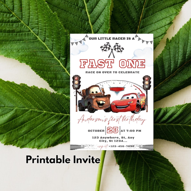 May include: A printable invitation with a racing theme. The design features the text "FAST ONE" and illustrations of cartoon cars. The invitation includes the date, time, and location for a birthday celebration.