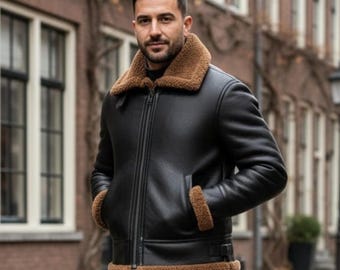May include: A black leather jacket with a brown faux fur collar and cuffs, worn with dark blue denim jeans and brown leather boots. The jacket features a full-length front zipper, long sleeves, and a structured fit, paired with slim-fit jeans.