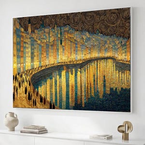 May include: A rectangular wall art print featuring a cityscape at night with illuminated buildings in shades of blue, yellow, and orange. The scene includes a river reflecting the city lights, a pedestrian walkway with silhouettes, and a dark sky.