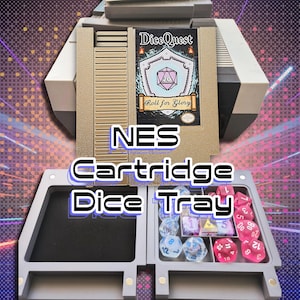 May include: A gold-colored NES cartridge with "DiceQuest" and "Roll for Glory" text. Below, a gray dice tray is open, revealing various dice in pink, blue, and clear colors. The text "NES Cartridge Dice Tray" is displayed.