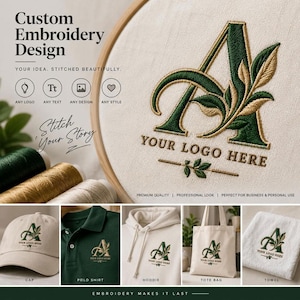 May include: A custom embroidery design featuring a large letter A stitched in dark green with gold leaf accents on off-white fabric. The design includes the text YOUR LOGO HERE. Examples show the embroidery on a cap, polo shirt, hoodie, tote bag, and towel.