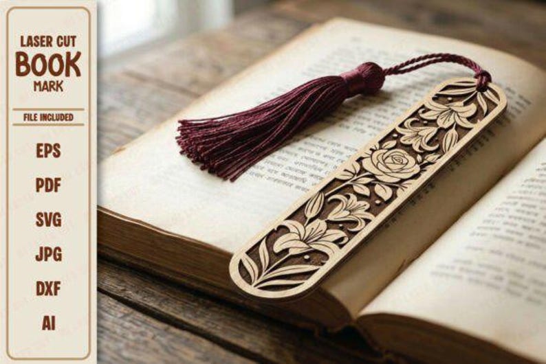 Puede incluir: Un marcap&aacute;ginas de madera cortado con l&aacute;ser con dise&ntilde;os florales, incluyendo rosas y lirios, y una borla burdeos. El marcap&aacute;ginas est&aacute; colocado en un libro abierto con p&aacute;ginas envejecidas. El texto "LASER CUT BOOK MARK" es visible.