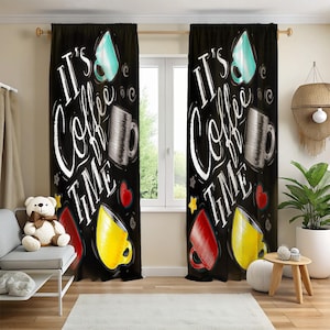 May include: Black window curtains featuring the text "It's Coffee Time" in white script. The design includes illustrations of coffee cups in teal, grey, red, and yellow. The curtains are hanging in front of a window.