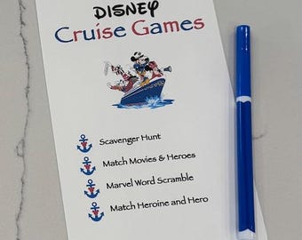 May include: A white card with rounded corners featuring the text "DISNEY Cruise Games" in blue and red. The card includes a graphic of Disney characters on a boat and lists game options like "Scavenger Hunt." A blue marker is next to the card.