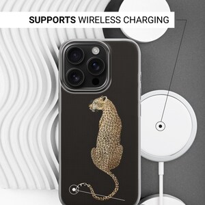 May include: A black phone case featuring a detailed illustration of a leopard. The case has a clear border and the text "SUPPORTS WIRELESS CHARGING" and "SIDES ARE NOT PRINTED".