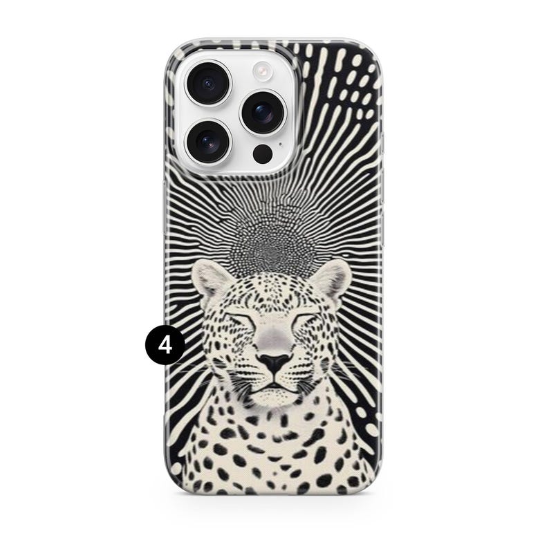 May include: A phone case featuring a black and white design. The case has a black and white leopard illustration with closed eyes, set against a radiating sunburst pattern. The case has a glossy finish.