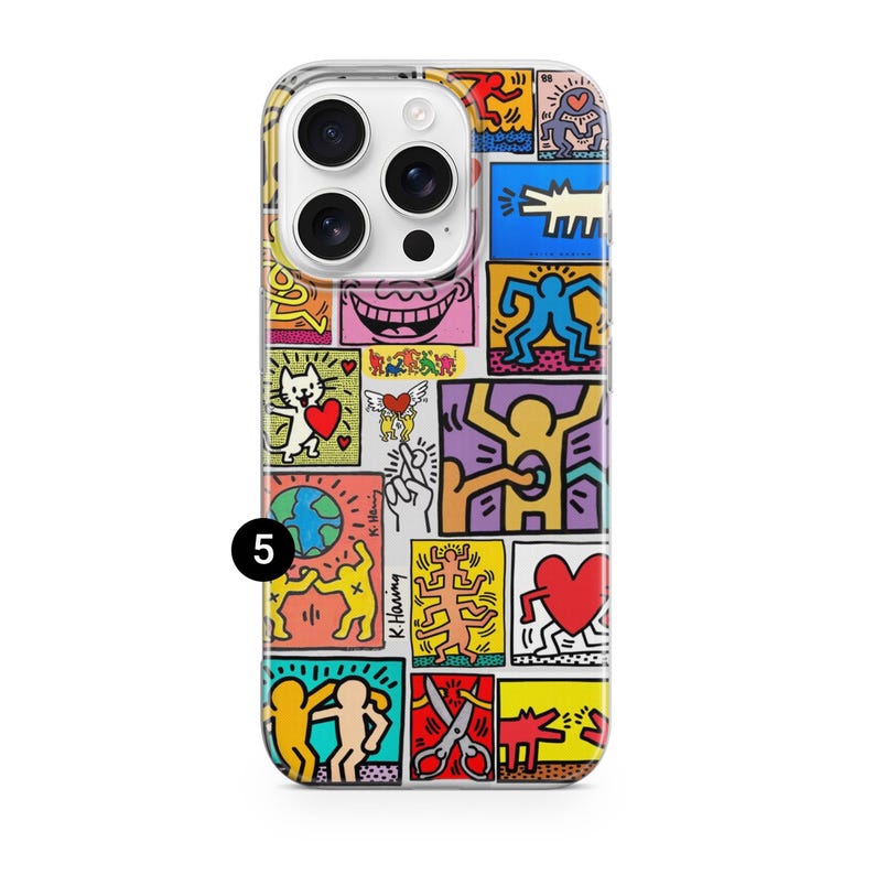 May include: A colorful phone case featuring a pop art design with various figures and shapes in vibrant colors. The case has a clear border and a camera cutout. The design includes hearts, figures, and the artist's signature.