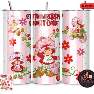 May include: Three cylindrical tumblers with metal straws featuring a pink and white vertical striped pattern. The design includes illustrations of a character with a strawberry hat, red flowers, green vines, and the text Strawberry Shortcake.