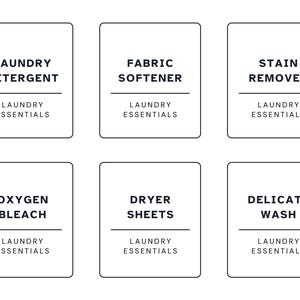 May include: Six white rectangular labels with black text for laundry essentials. The labels read: Laundry Detergent, Fabric Softener, Stain Remover, Oxygen Bleach, Dryer Sheets, and Delicate Wash. The text "Laundry Essentials" appears below each label.