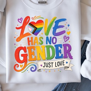 Może przedstawiać: Biała bluza z kolorową grafiką z napisem "LOVE HAS NO GENDER JUST LOVE". Słowo "LOVE" jest w kolorze pomarańczowym, zielonym i fioletowym. Serce ma tęczowy wzór. Słowo "GENDER" jest w tęczowych kolorach.