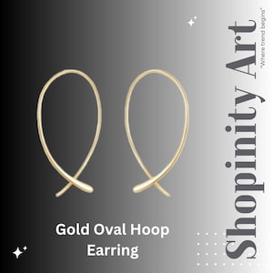 May include: A pair of gold oval hoop earrings. The earrings have a simple, elegant design with a smooth, polished finish. The text "Gold Oval Hoop Earring" is displayed at the bottom of the image, with the Shopinity Art logo on the right.
