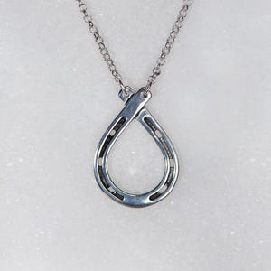 Charmed - Hufeisennagel in Silber