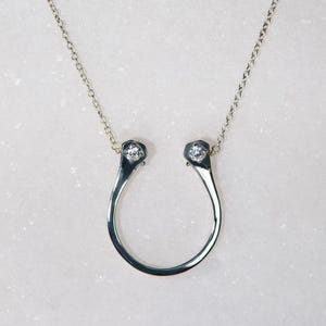 Charmed - Hufeisennagel in Silber