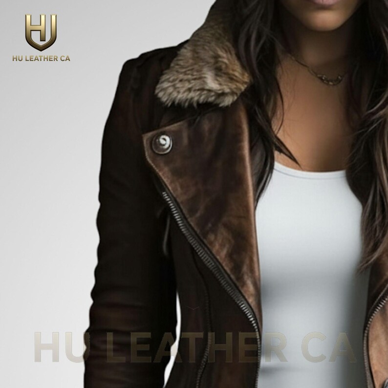 May include: A brown leather jacket with a fur collar and a zipper closure. The jacket has a distressed look and the text "HU LEATHER CA" is visible.
