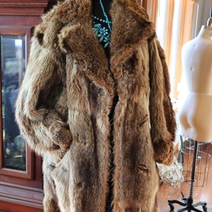 Raccoon store coat 1920s