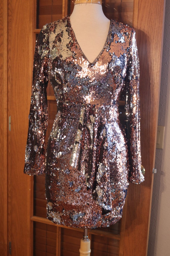 Dancing sequin eighties cocktail dress vegas weddi