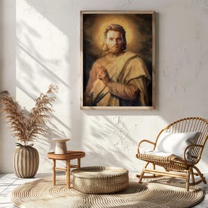 May include: A framed portrait of a man with long hair and a halo, dressed in light-colored robes. The artwork has a vintage, painterly style. The image is displayed on a white wall, with a wooden frame.