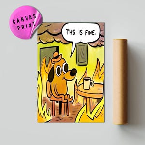 May include: A canvas print featuring a cartoon dog in a burning room, with the text "THIS IS FINE" in a speech bubble. The dog is wearing a hat and sitting calmly. A rolled-up poster is next to the print.