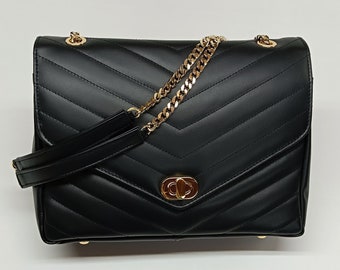 chanel women's pre-loved black lambskin chevron envelope bag