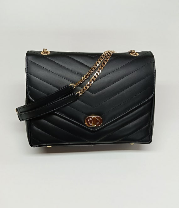 chanel black quilted caviar leather medallion tote