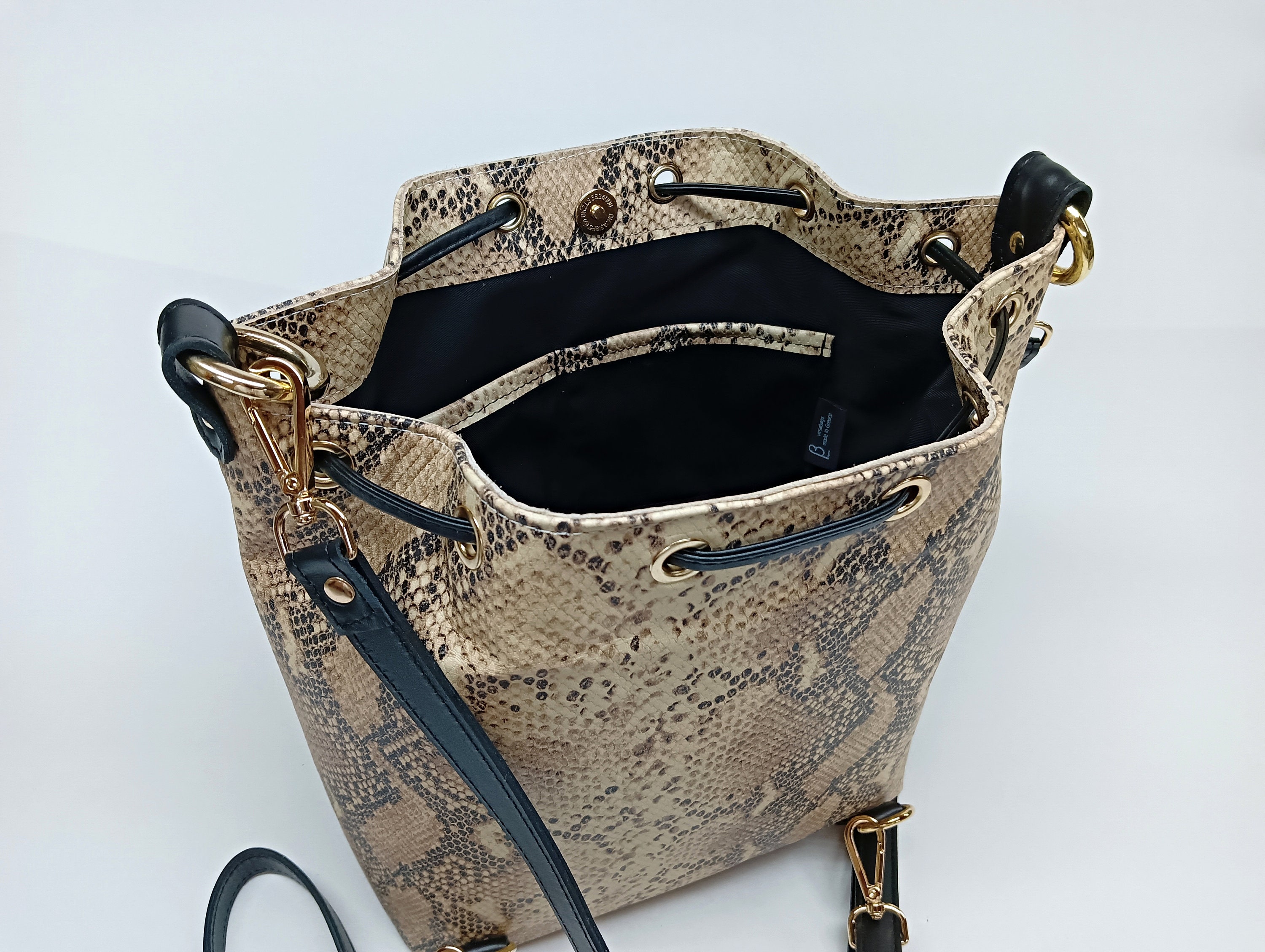 Sweetovo Women Vintage Bucket Handbag Snake Printed Faux Leather Crossbody  Shoulder Bag with Double Metal Zipper: Handbags