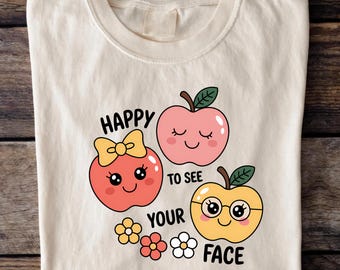 Camiseta de profesora con colores cómodos: caras felices y garabatos de frutas