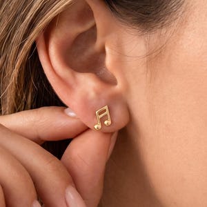 May include: A rustic wooden sign with the text "Welcome to our home" in white lettering. The sign has a distressed finish and a simple, inviting design, ideal for entryway decor.