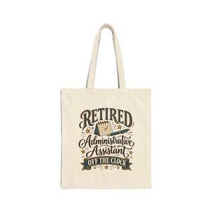 May include: A beige canvas tote bag featuring a dark graphic print with the text "RETIRED Administrative Assistant OFF THE CLOCK". The design includes a calendar icon with a checkmark and a pen, surrounded by small star accents.