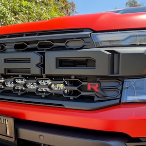 Ford Next Gen Ranger Raptor front grill R badge (carbon fiber infill)