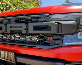 Ford Next Gen Ranger Raptor front grill R badge (carbon fiber infill)