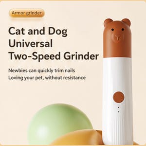 May include: A white and brown two-speed pet nail grinder with a bear-shaped top. The image text reads "Cat and Dog Universal Two-Speed Grinder". The grinder is designed for easy nail trimming for pets.